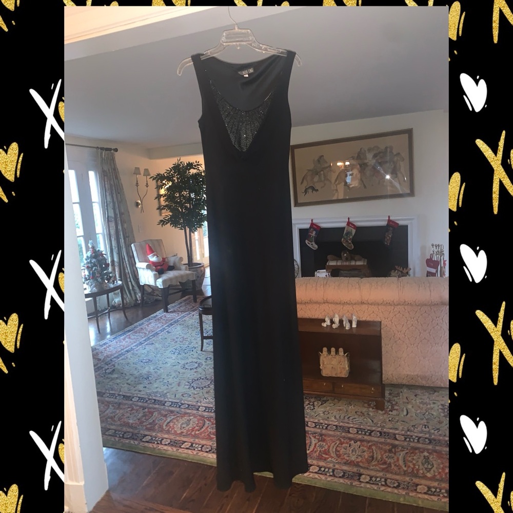 Melinda Eng black crepe gown with black sequin detail at the neck.